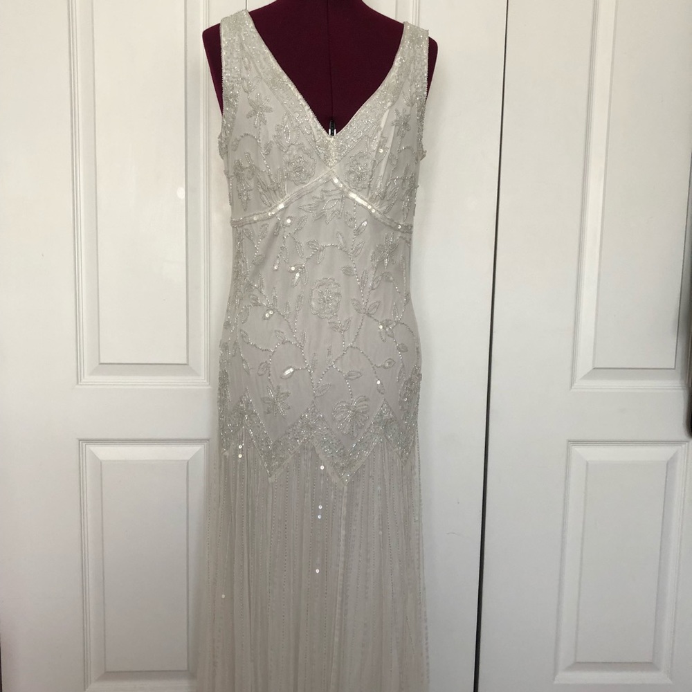 Pisarro Nights white beaded gown